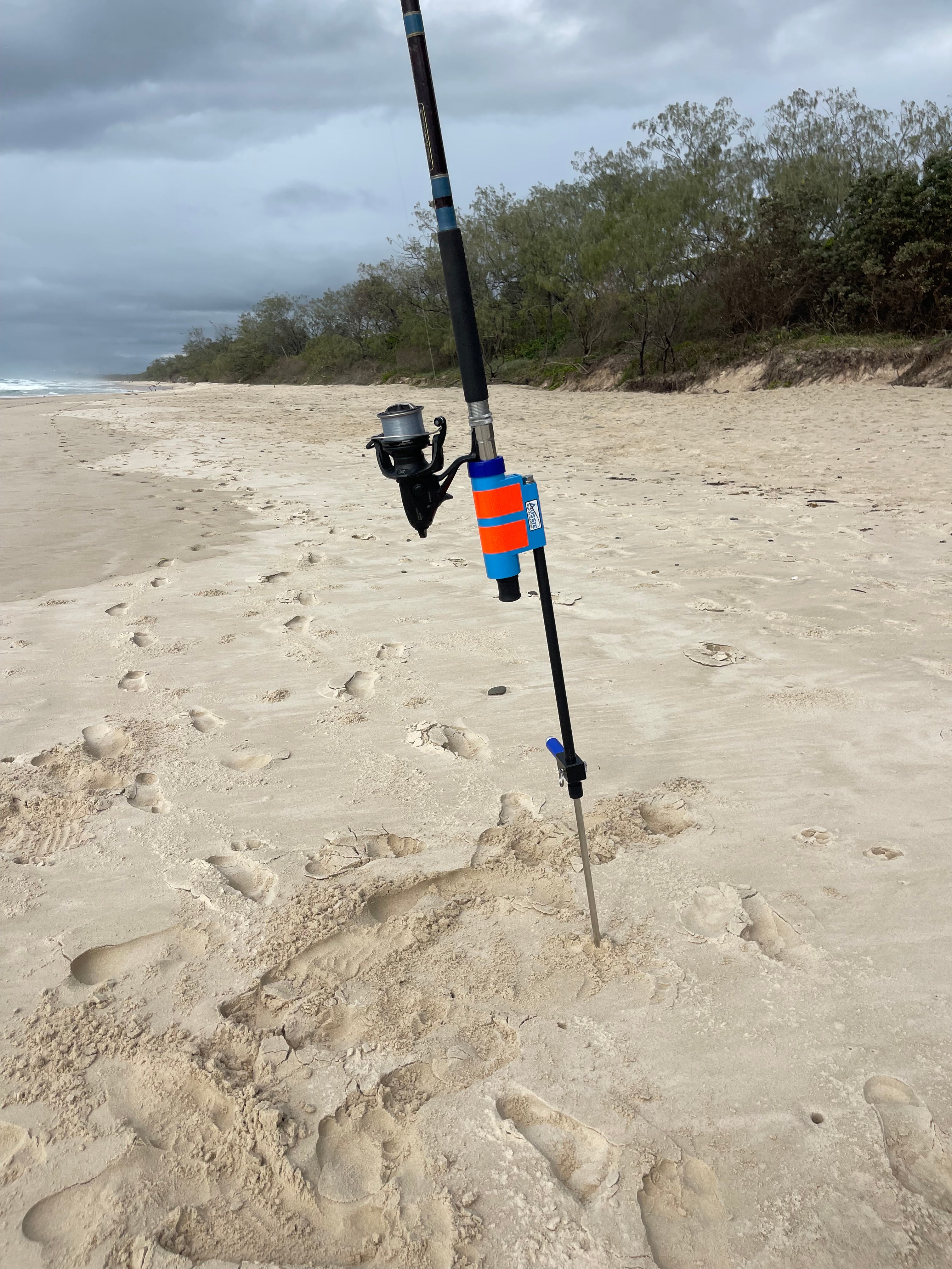 Stainless steel and fibreglass Aussie Rod Holder on beach blue