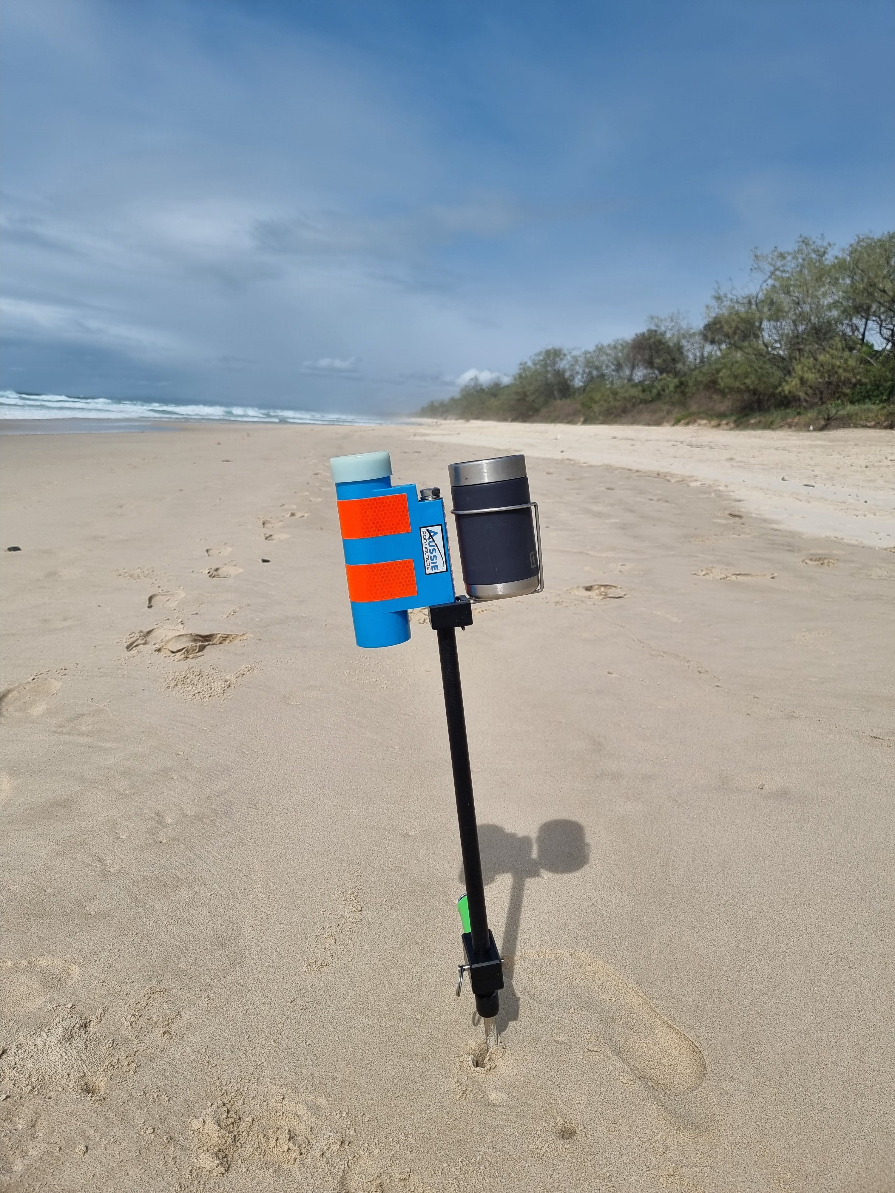 Beach fishing rod holder and sand spike with cup holder