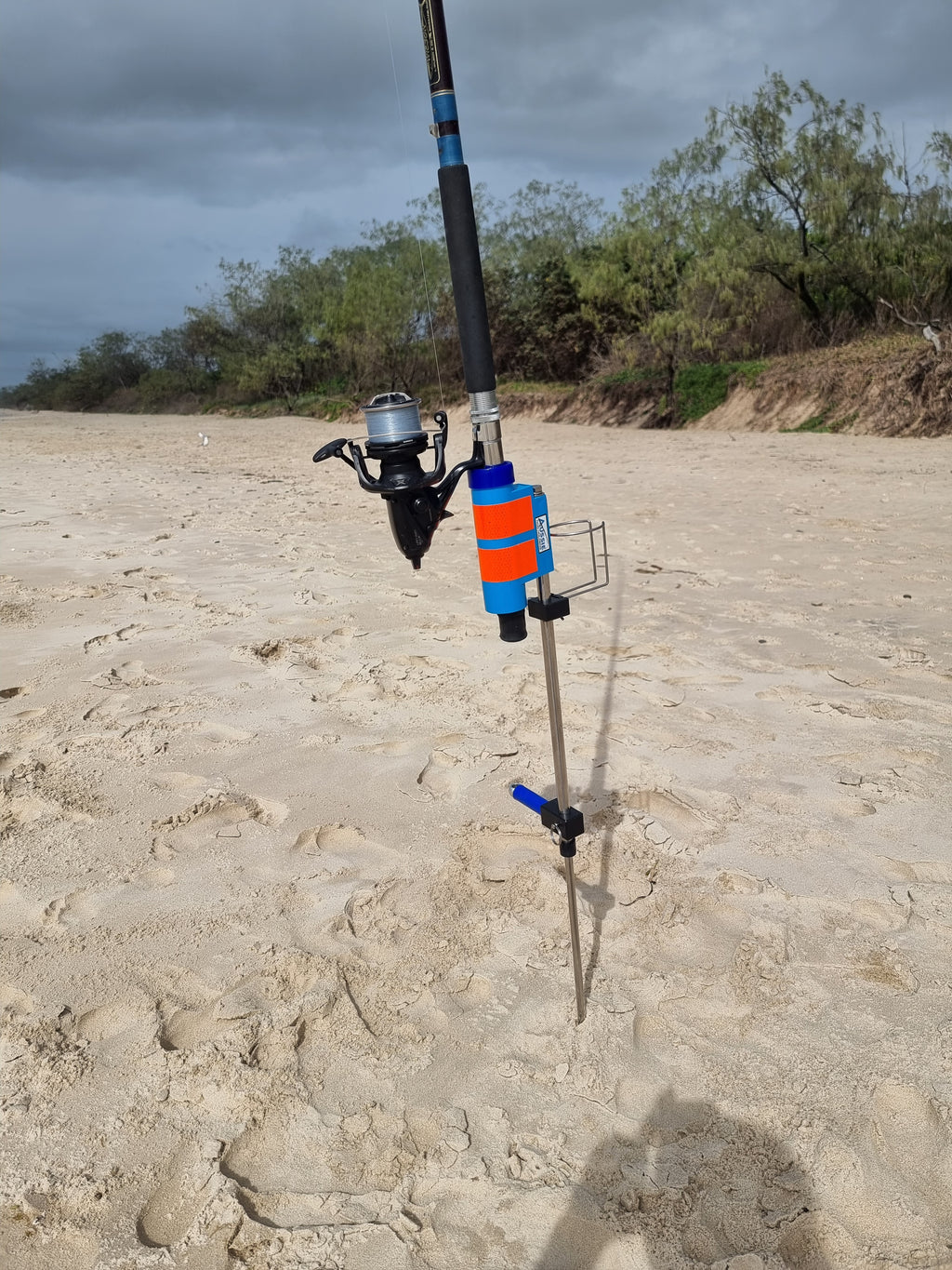 Fishing Rod and Reel in Stainless Steel rod holder with cup holder