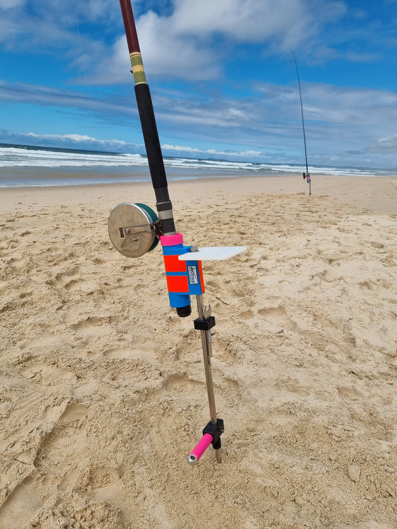 Snyder Glass rod in Stainless Steel rod holder with bait board on beach