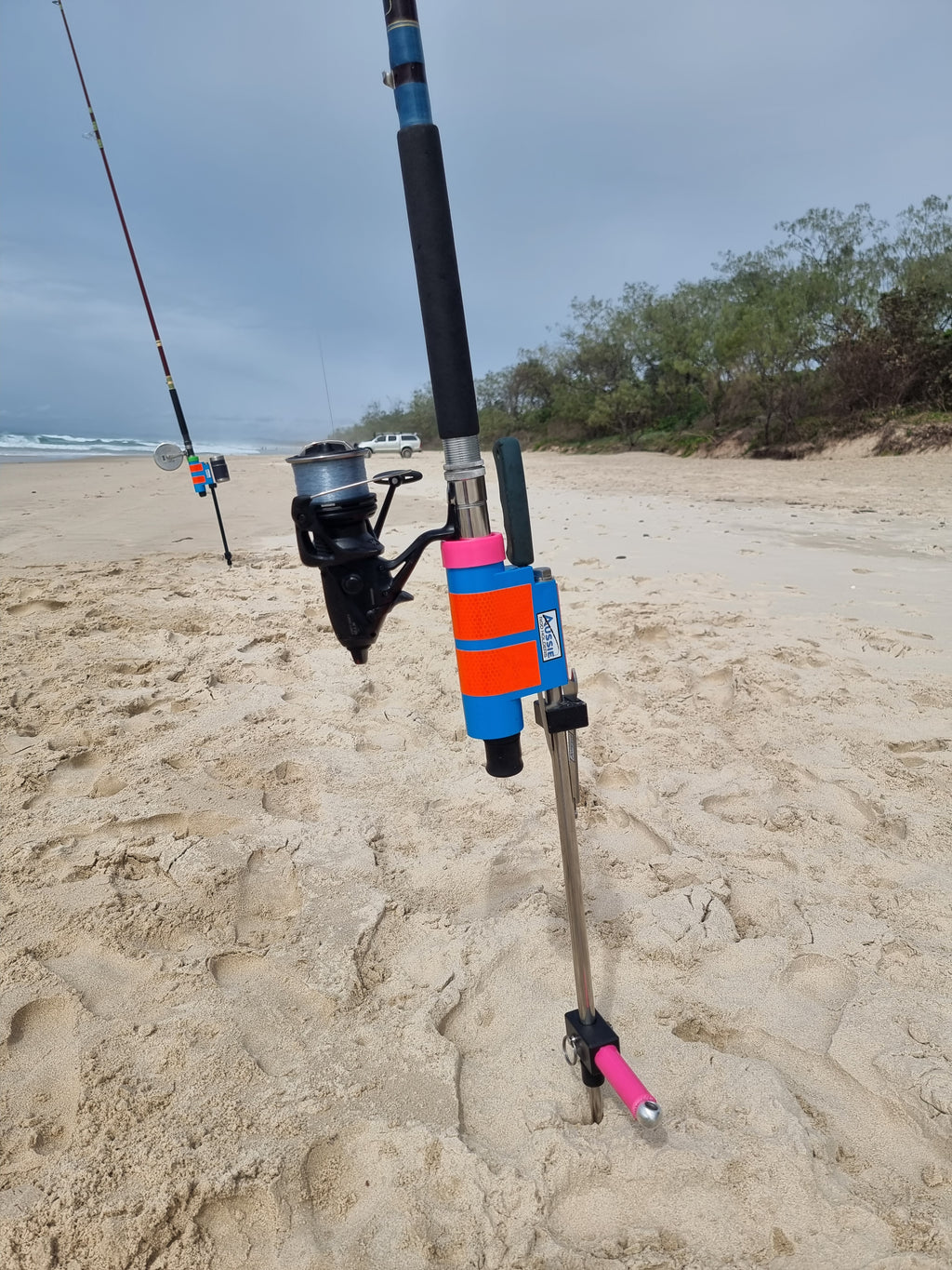 Stainless Steel beach Fishing Rod Holder with fishing knife and FWD in background