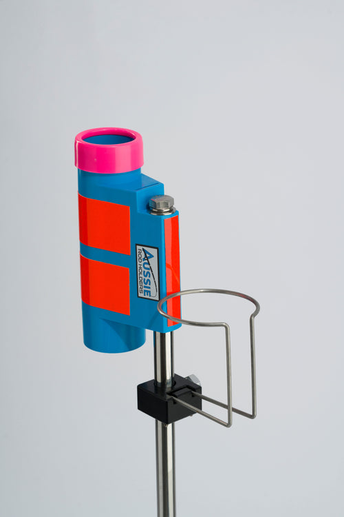 Blue and pink fishing rod holder with drinks holder attachment