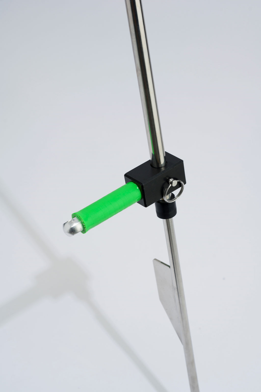 Green foot peg on stainless steel sand spike