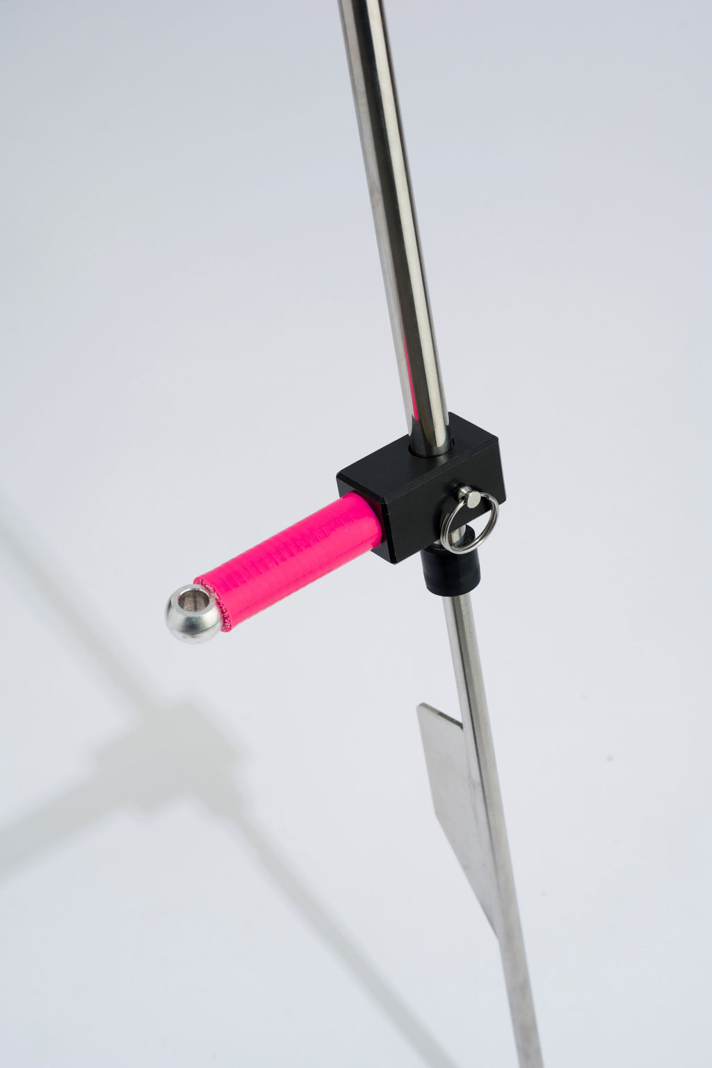 Pink foot peg on stainless steel sand spike