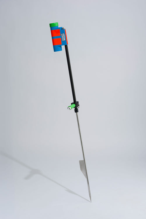 Blue and green fishing rod holder with fibreglass tube, foot peg and stainless steel sand spike on white background