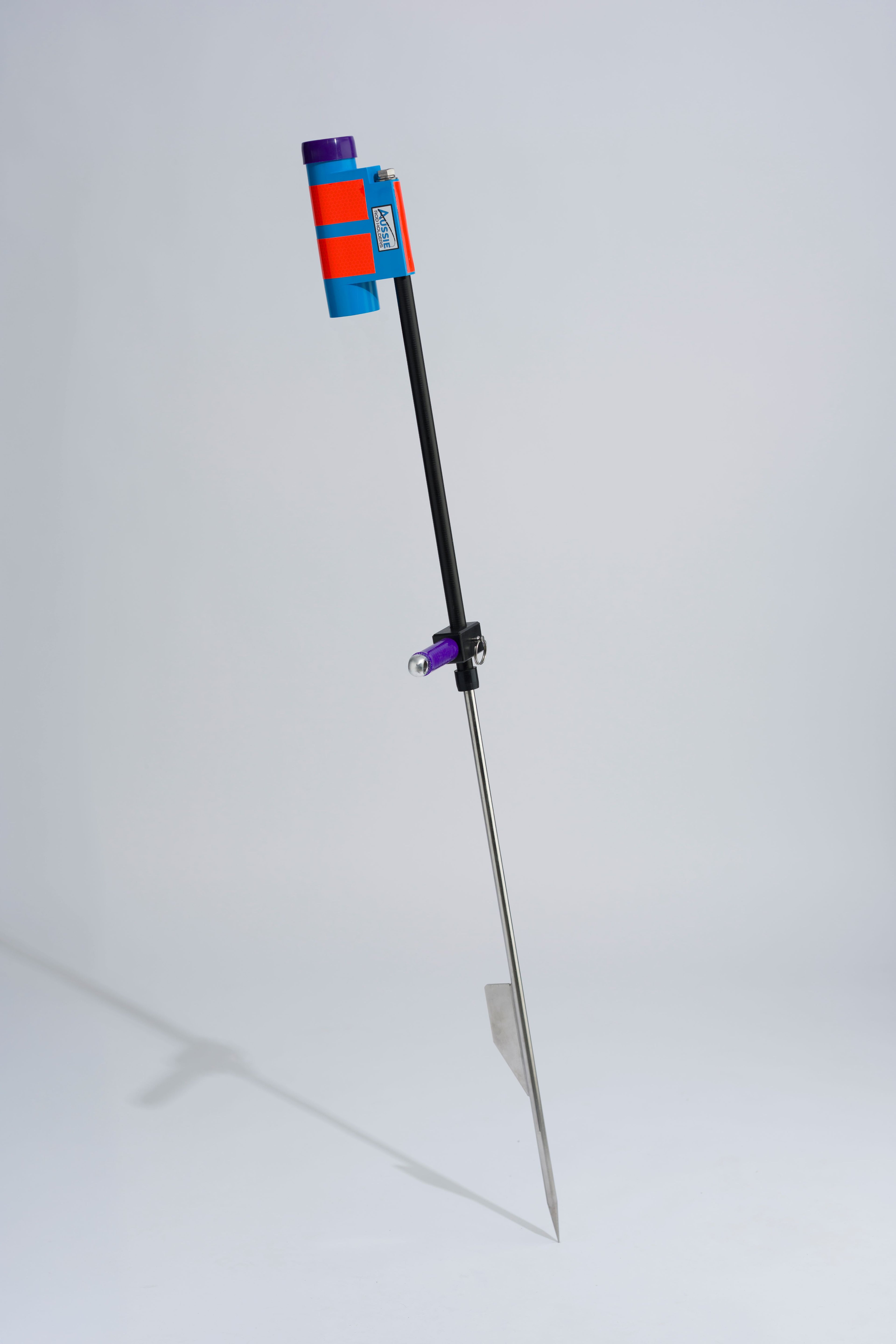 Blue and purple fishing rod holder with fibreglass tube, foot peg and stainless steel sand spike on white background