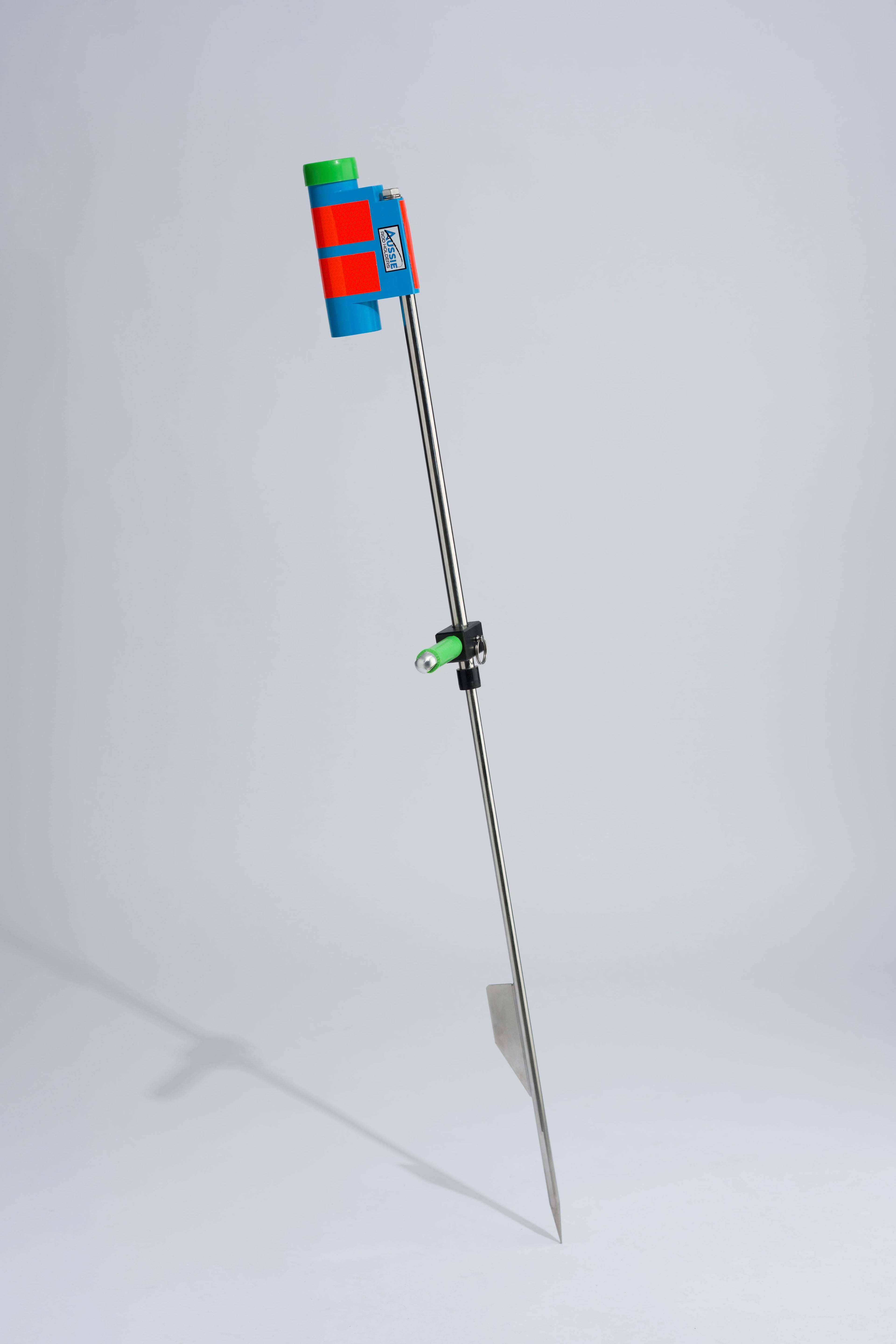 Blue and green fishing rod holder with foot peg and stainless steel sand spike on white background