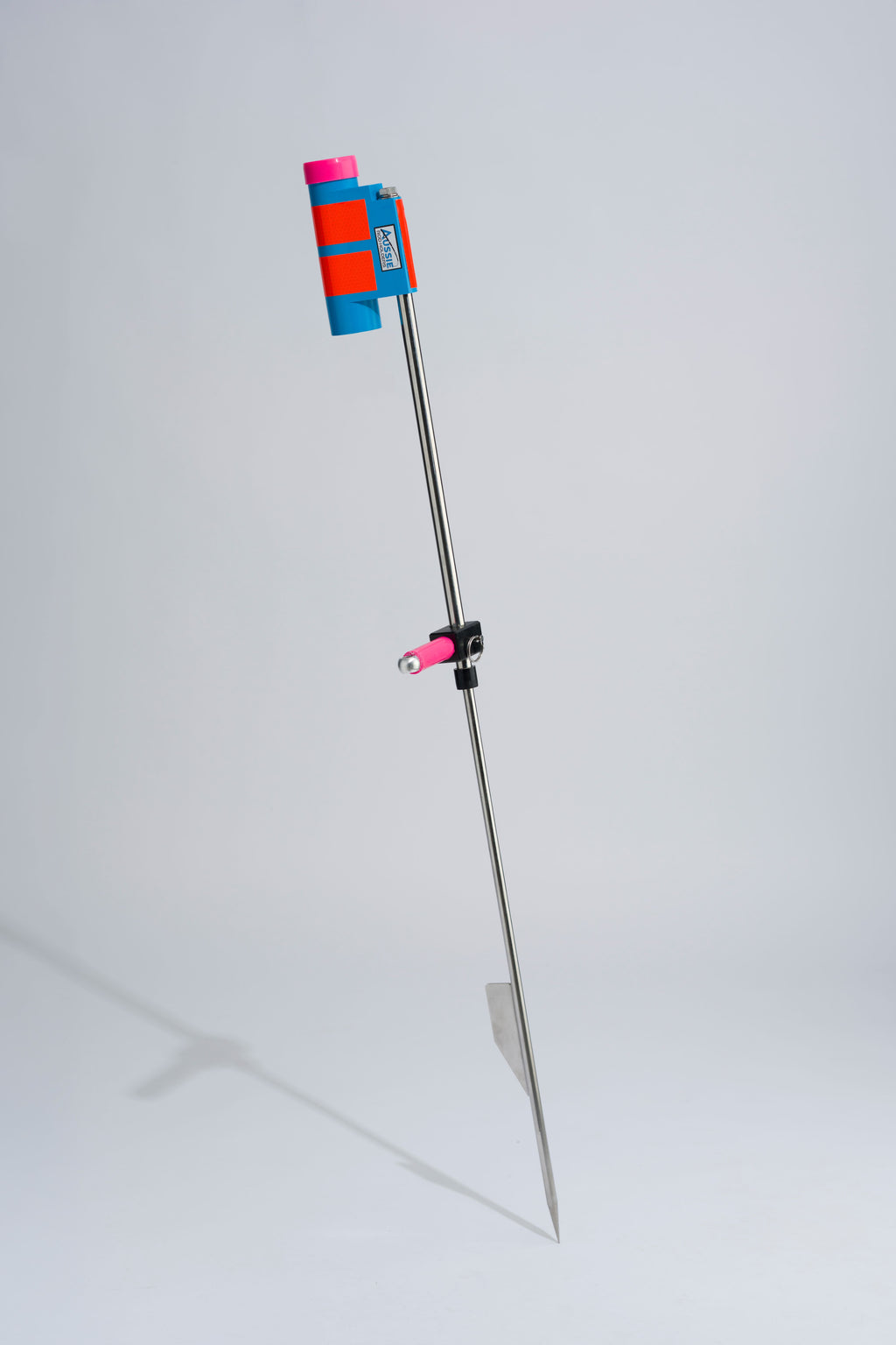 Blue and pink fishing rod holder with foot peg and stainless steel sand spike on white background