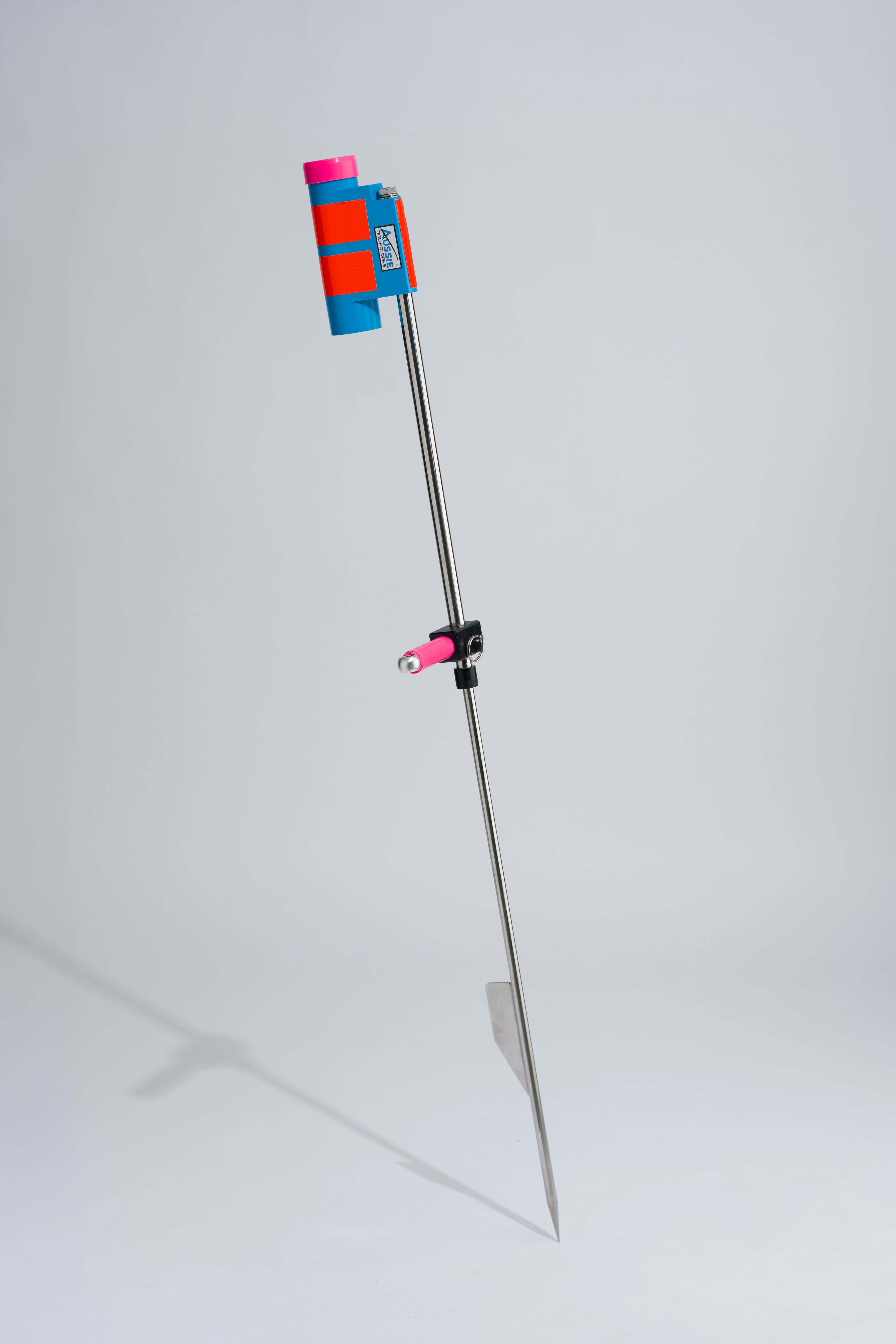 Blue and pink fishing rod holder with foot peg and stainless steel sand spike on white background